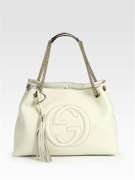 gucci f40|white Gucci handbag.